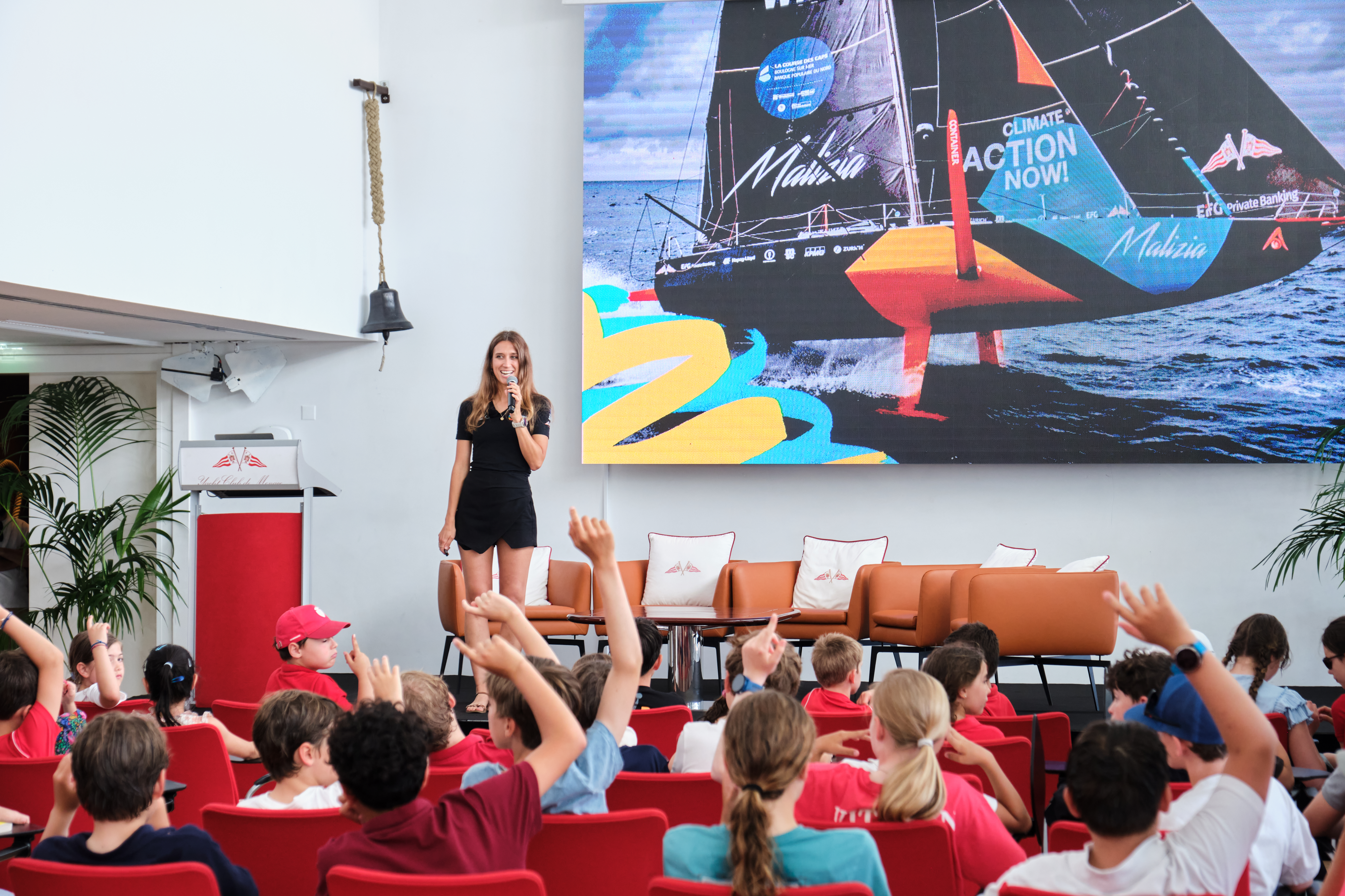 Children from the YCM sailing school ready to ask their many questions to Helene Katz (photo) and Flore Hartout during the My Ocean Challenge event in Monaco