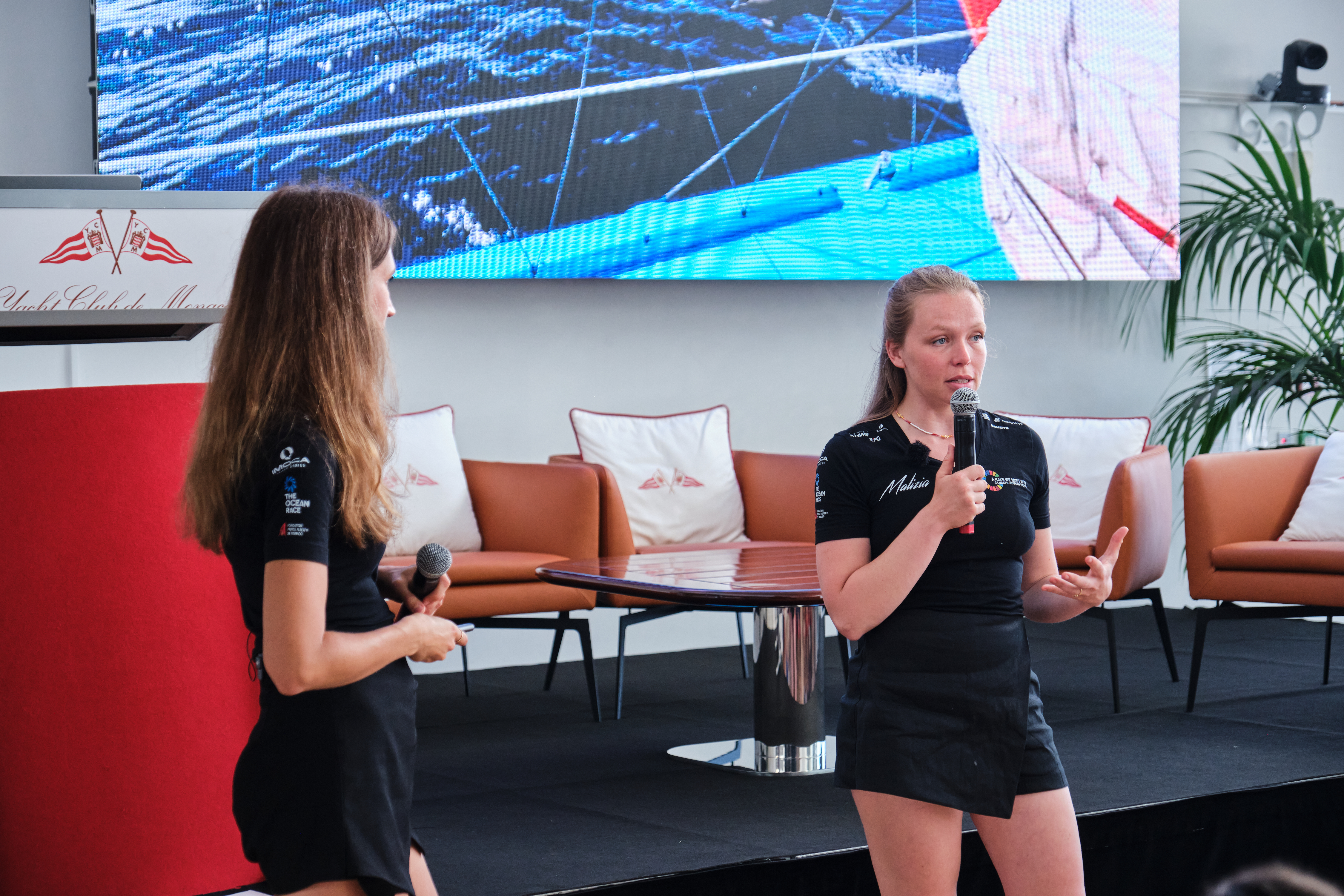 Flore Hartout (right) shared her experience as an onboard reporter during crew races in 2025 with the young sailors of the YCM sailing school during a French My Ocean Challenge event