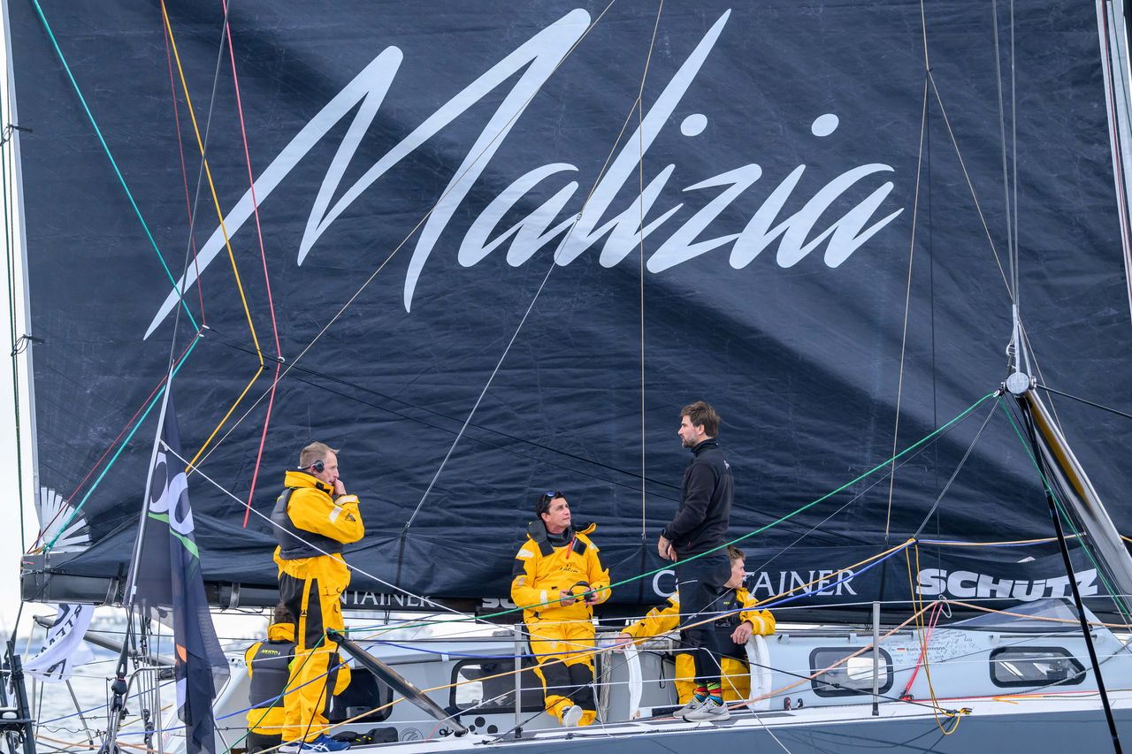 From left to right: Stuart Mclachlan, Pifou Dargnies, and Will Harris all stayed onboard with Boris until shortly before the start of the Vendée Globe, and are all also his first point of contact if he faces a technical issue at sea during the race