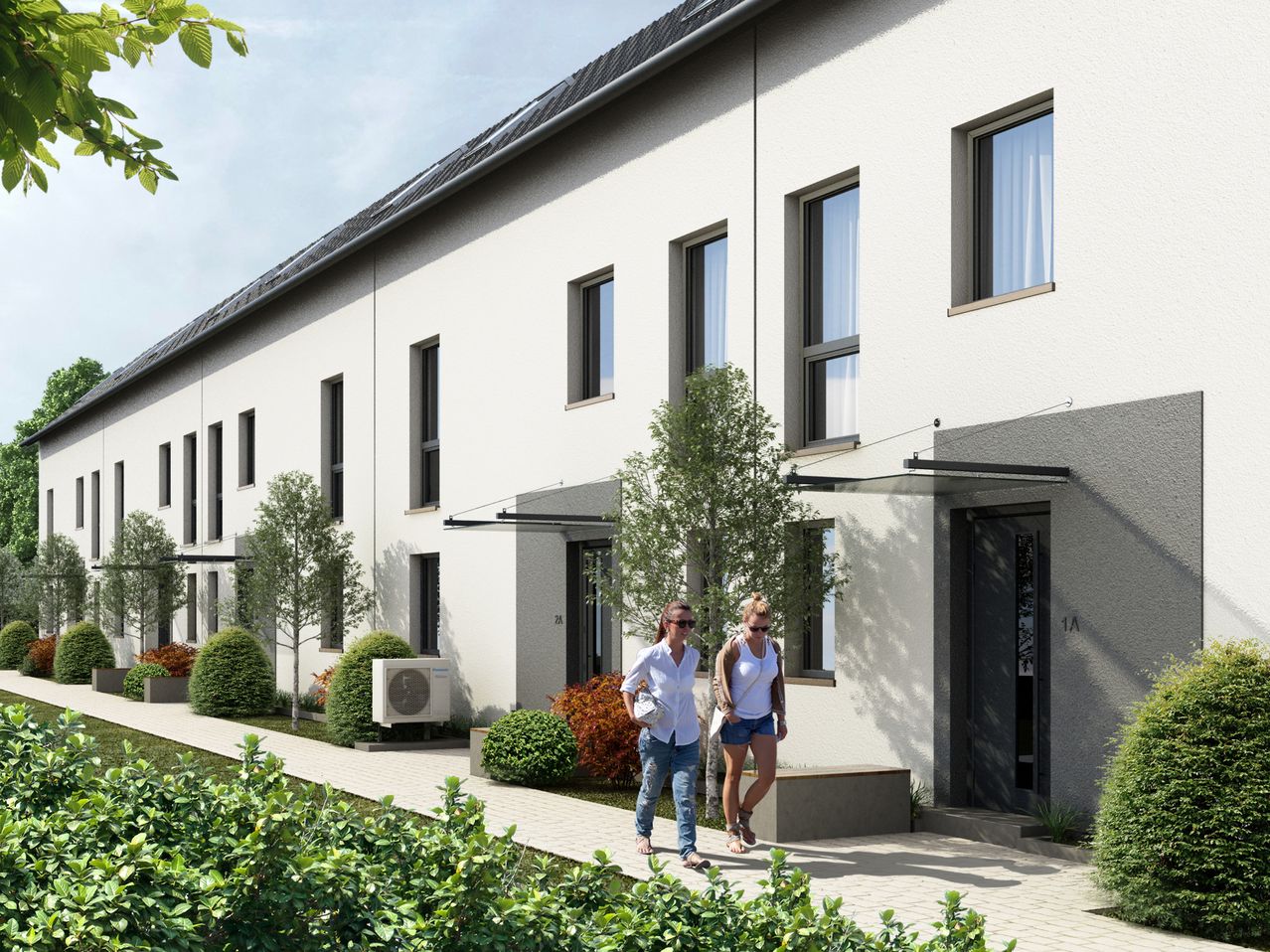 Neubau von fünf Reihenhäusern in Wiesbaden-Erbenheim in KfW-40-Bauweise, energieeffizientes Wohnprojekt mit moderner Architektur und Begrünung