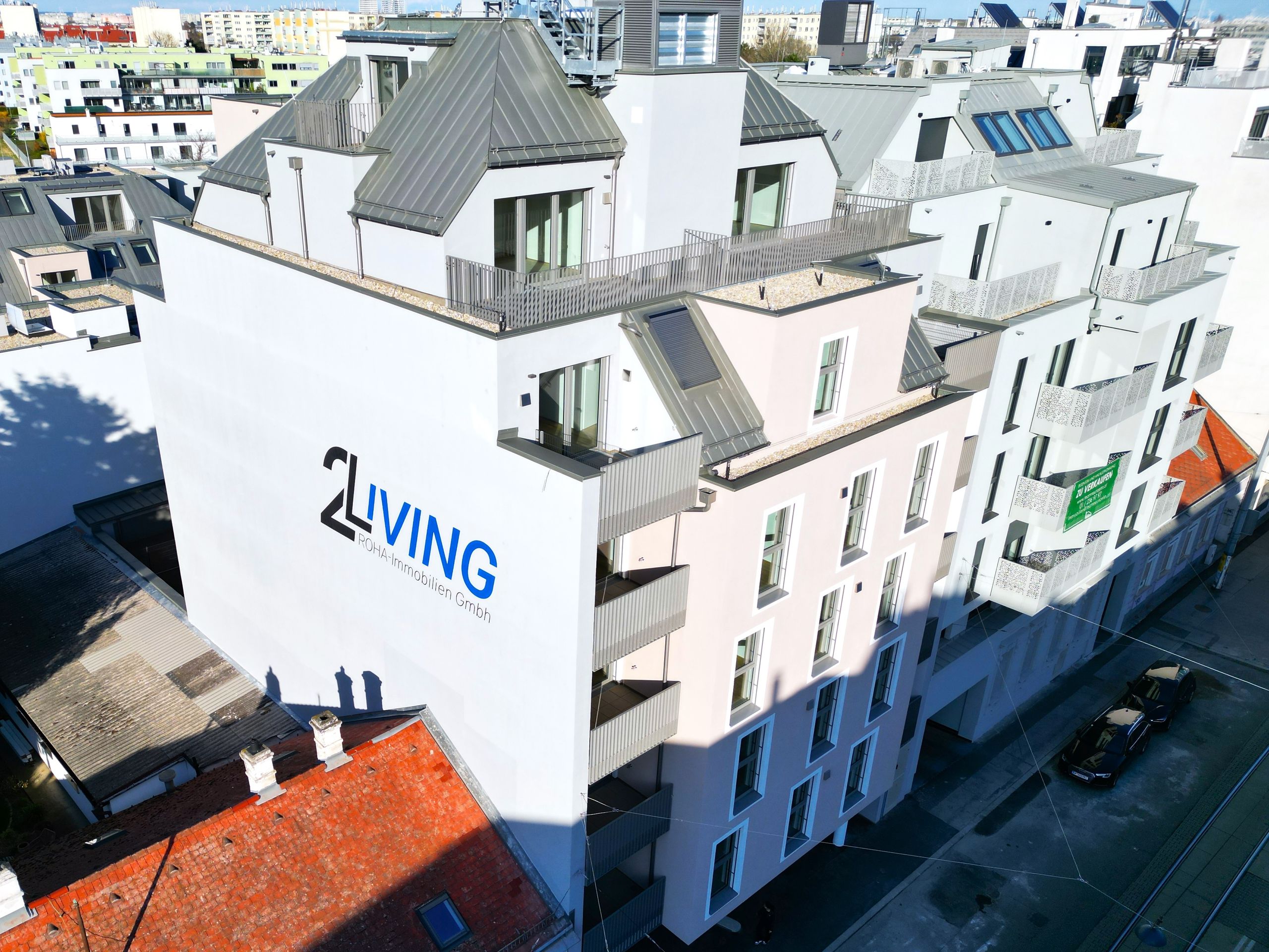 Luftaufnahme eines 2Living Wohnbauprojekts in Wien, umgesetzt mit PLANFRED