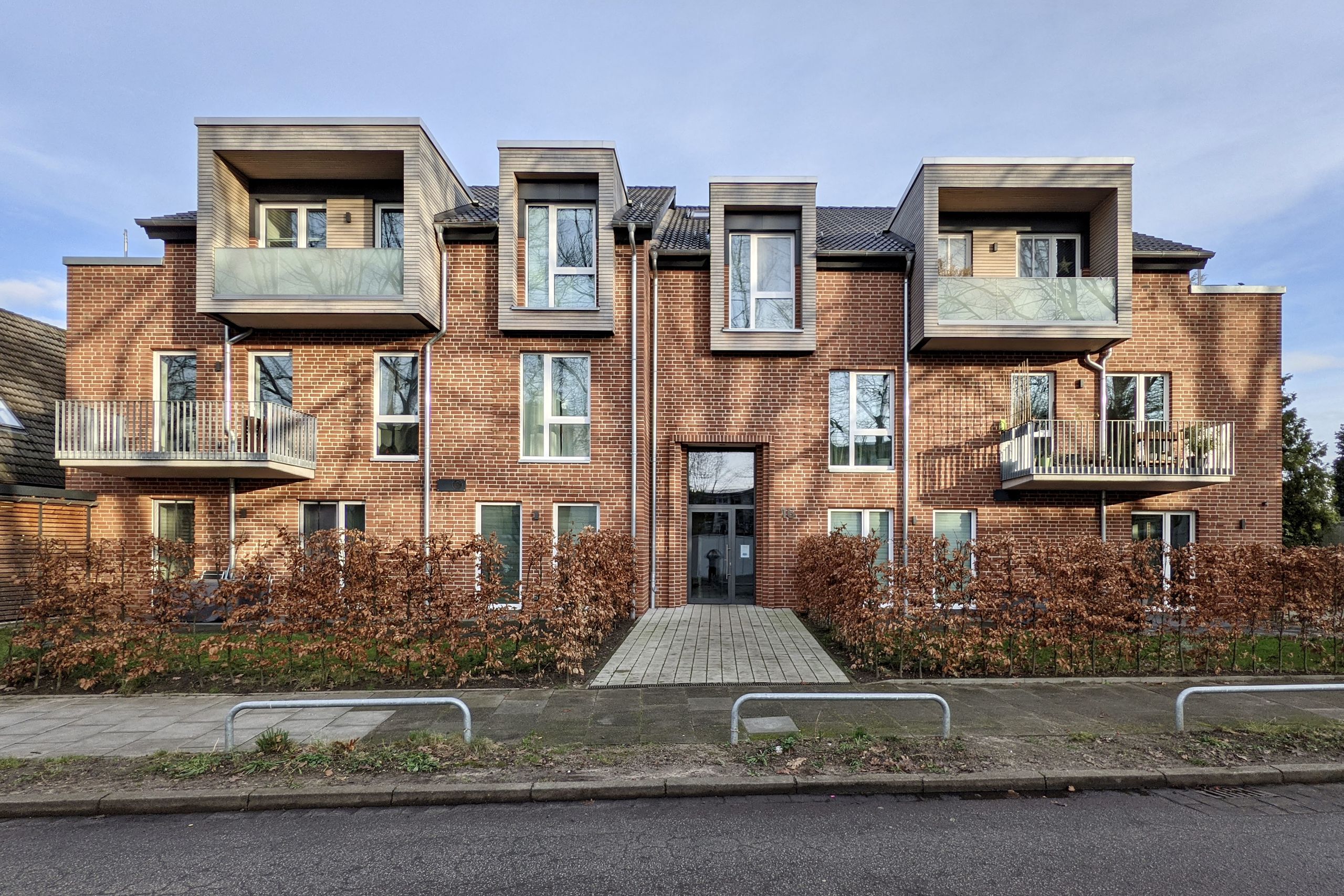 Mehrfamilienhaus Am Horner Moor in Hamburg – dreigeschossiger Klinkerbau mit Balkonen und Gauben, geplant von Stadtblick GmbH mit PLANFRED als Projektplattform.