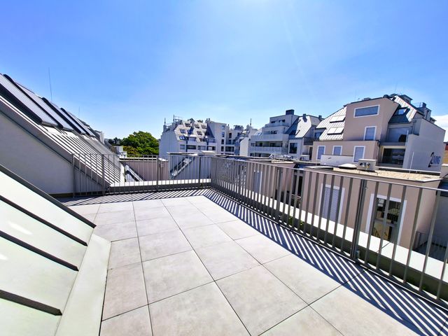 Moderne Dachterrasse eines 2Living Wohnbauprojekts in Wien