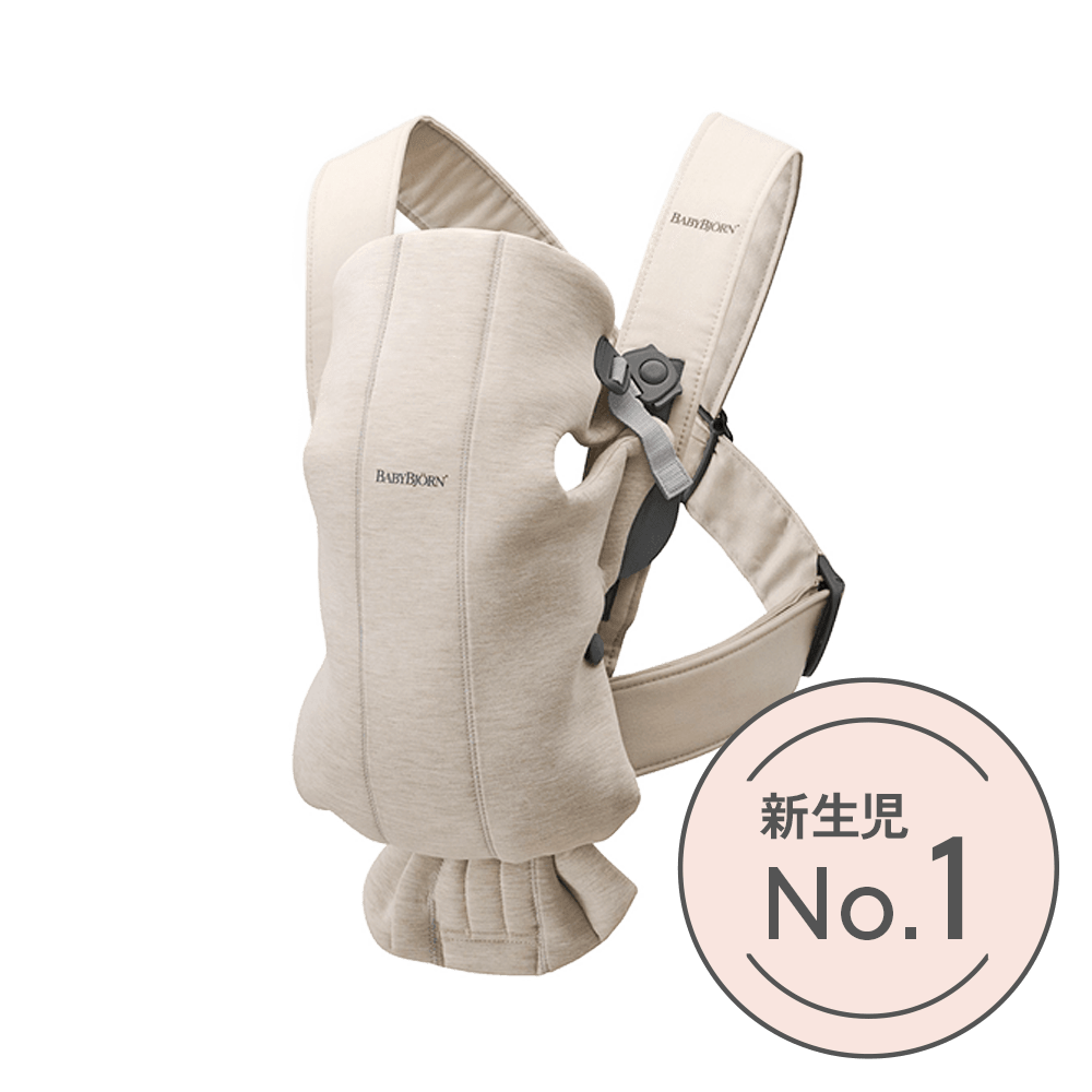 Beige baby carrier with adjustable straps and ergonomic design. Text in a circle reads "新生児 No.1" indicating top choice for newborns.