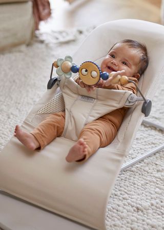 Ergonomic bouncers with natural rocking BabyBjorn