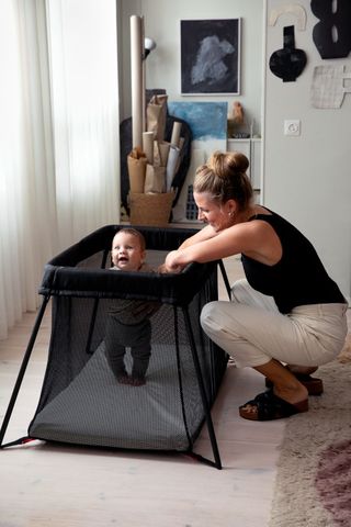 Baby and Mum with Travel Cot Light