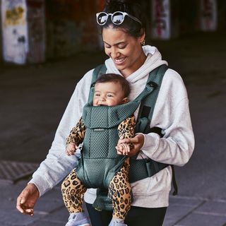 Why we love babywearing -  Curiosity