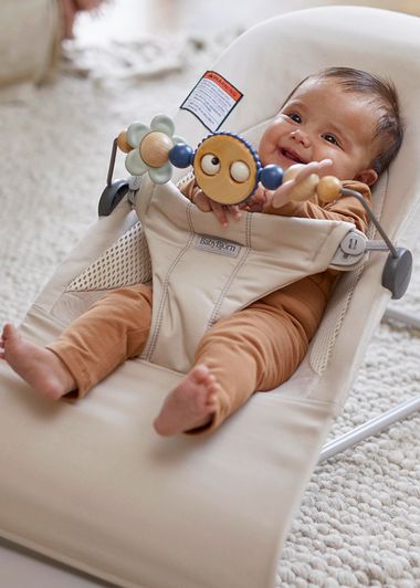 Bouncer Balance Soft in Light beige Woven/Jersey Trifabric wity toy bar Googly eyes pastels
