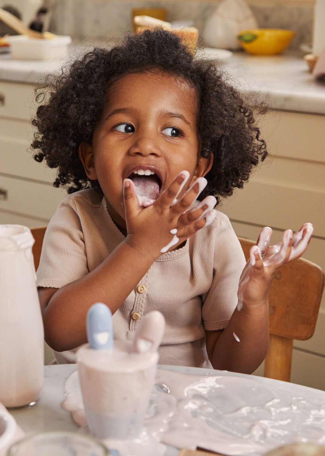 Baby cup with fork and baby spoon in pastel colours - BabyBjörn
