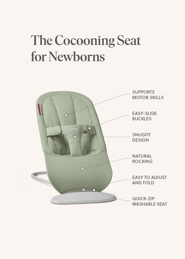 Green cocooning seat for newborns with features: motor skill support, easy-slide buckles, snugfit design, natural rocking, adjustable, washable.