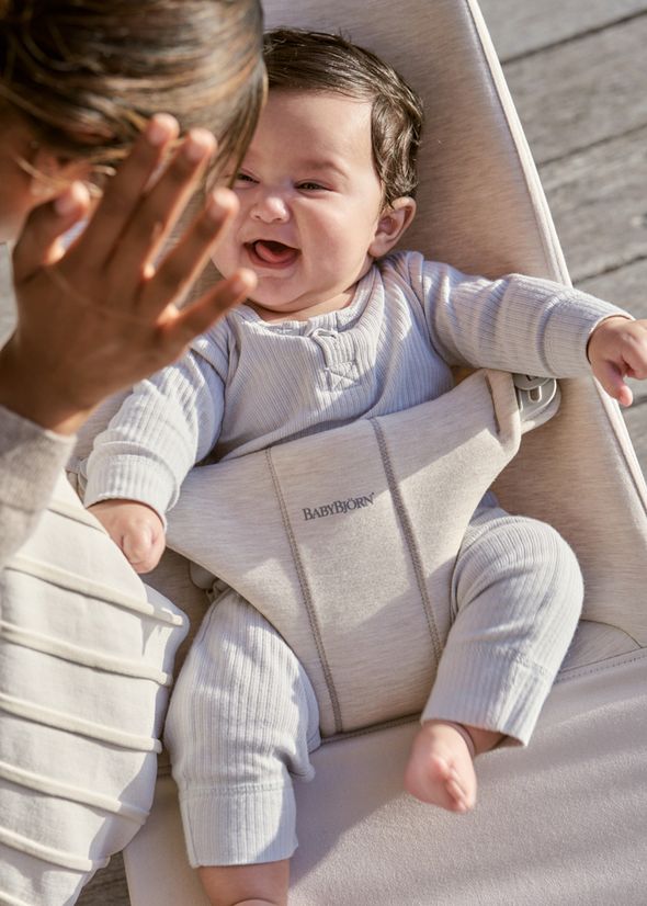 Baby in baby bouncer bliss light beige