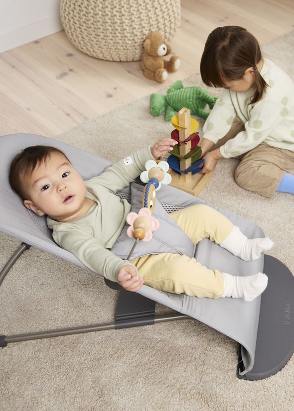 Bouncer Balance Soft in Light grey Woven/Jersey Trifabric with toy bar googly eyes pastel