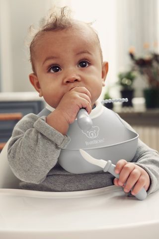 Small Baby Bib in Grey with spill pocket - BabyBjörn