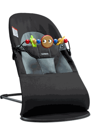 Bouncer Balance Soft in black/dark gray woven with toy googly eyes