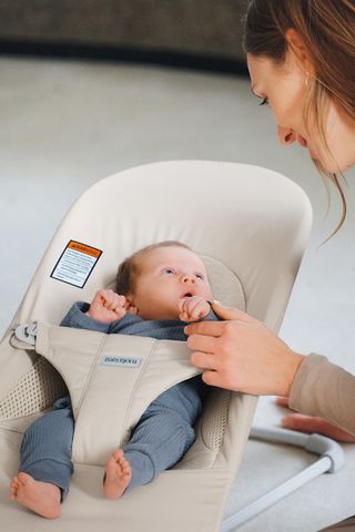 Baby sleeping in bouncer on sale