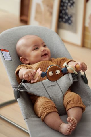 Baby bouncer with deals toys