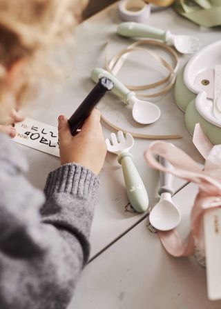 Powder Green Baby Feeding set from BabyBjörn, where holiday memories begin