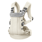 Beige ergonomic baby carrier with adjustable straps and breathable mesh fabric, designed for comfort and support.