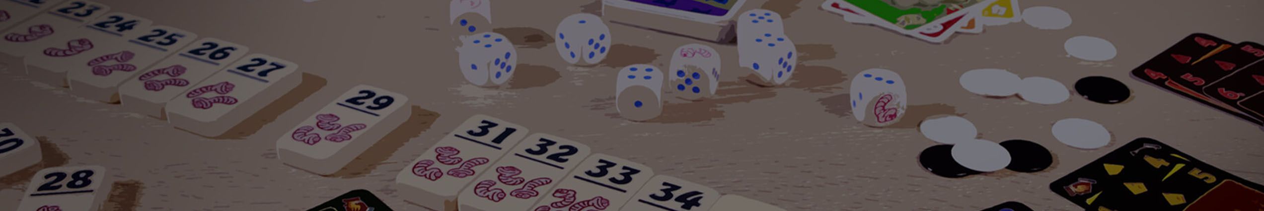 je ziet een banner met verschillende spel onderdelen van spellen van reiner knizia