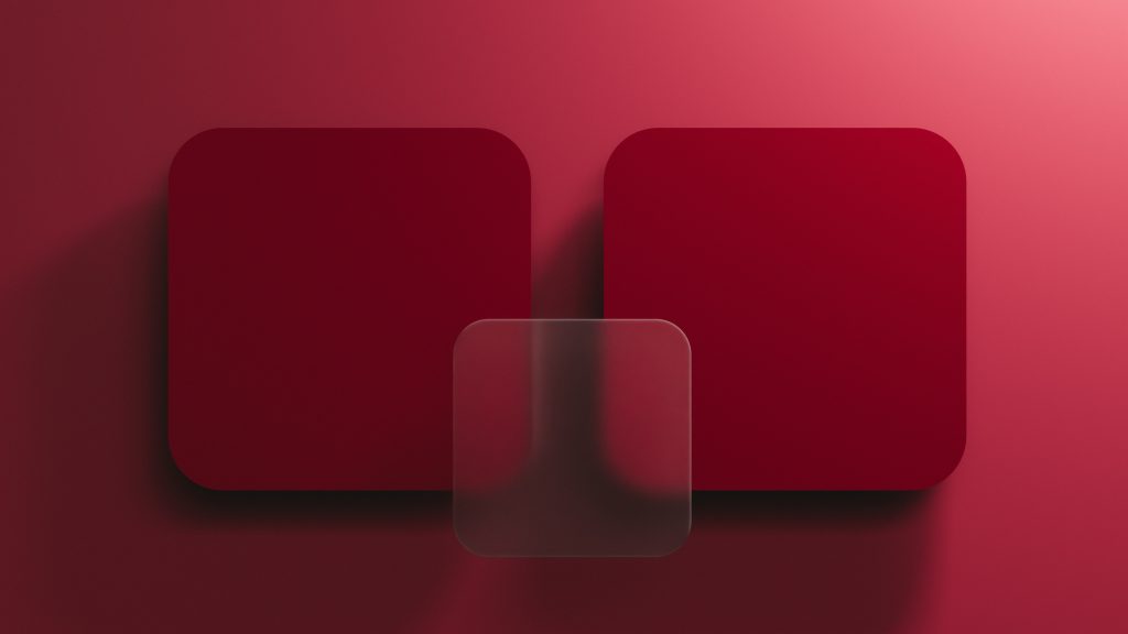 Two large red squares with rounded corners on a red background, overlapped by a smaller translucent square in the center.