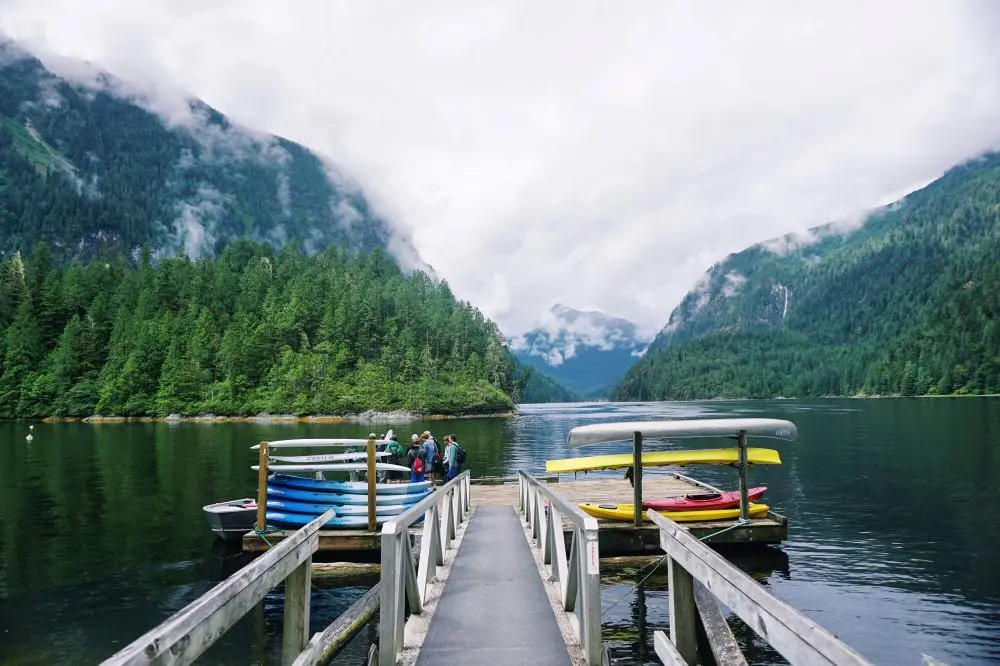 Kayaks On A Dock On A Lake Canada