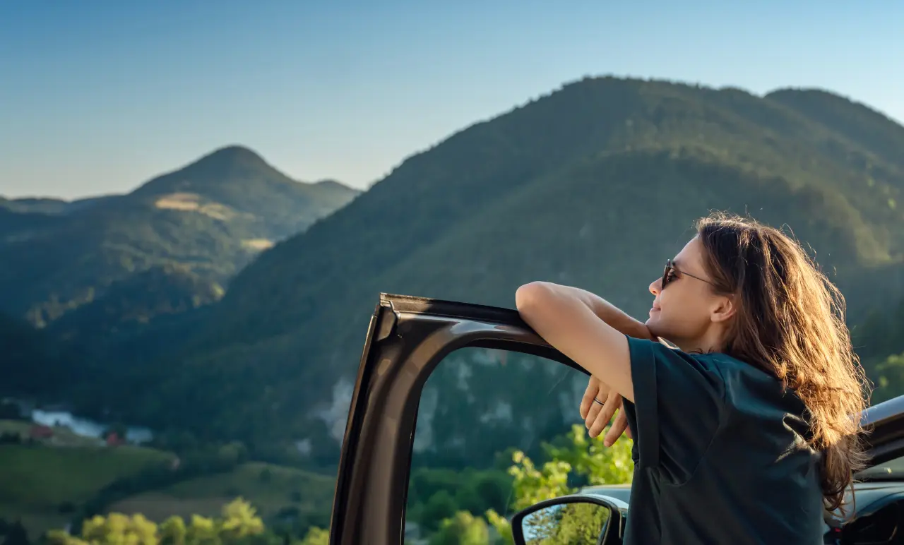 Women Looking Outside The Car