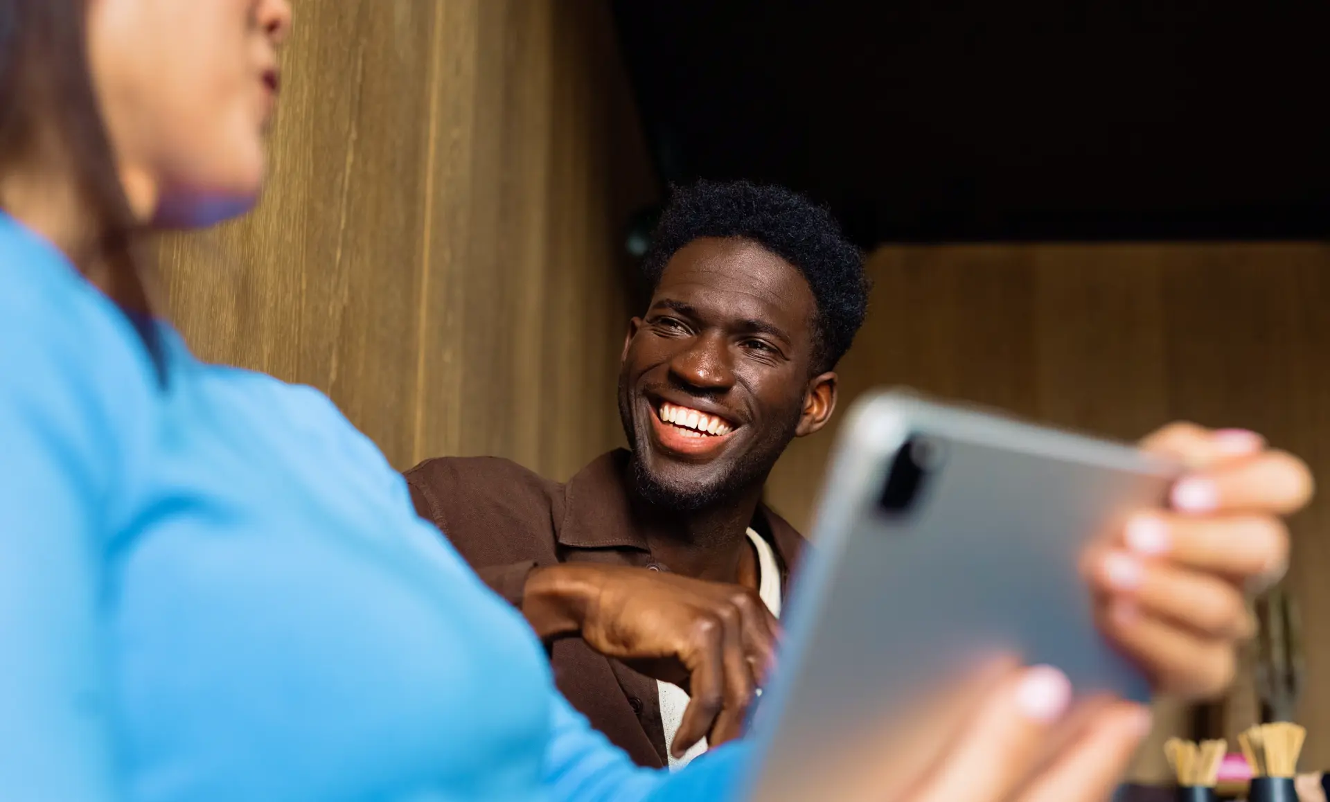 Coworkers Smiling Phone