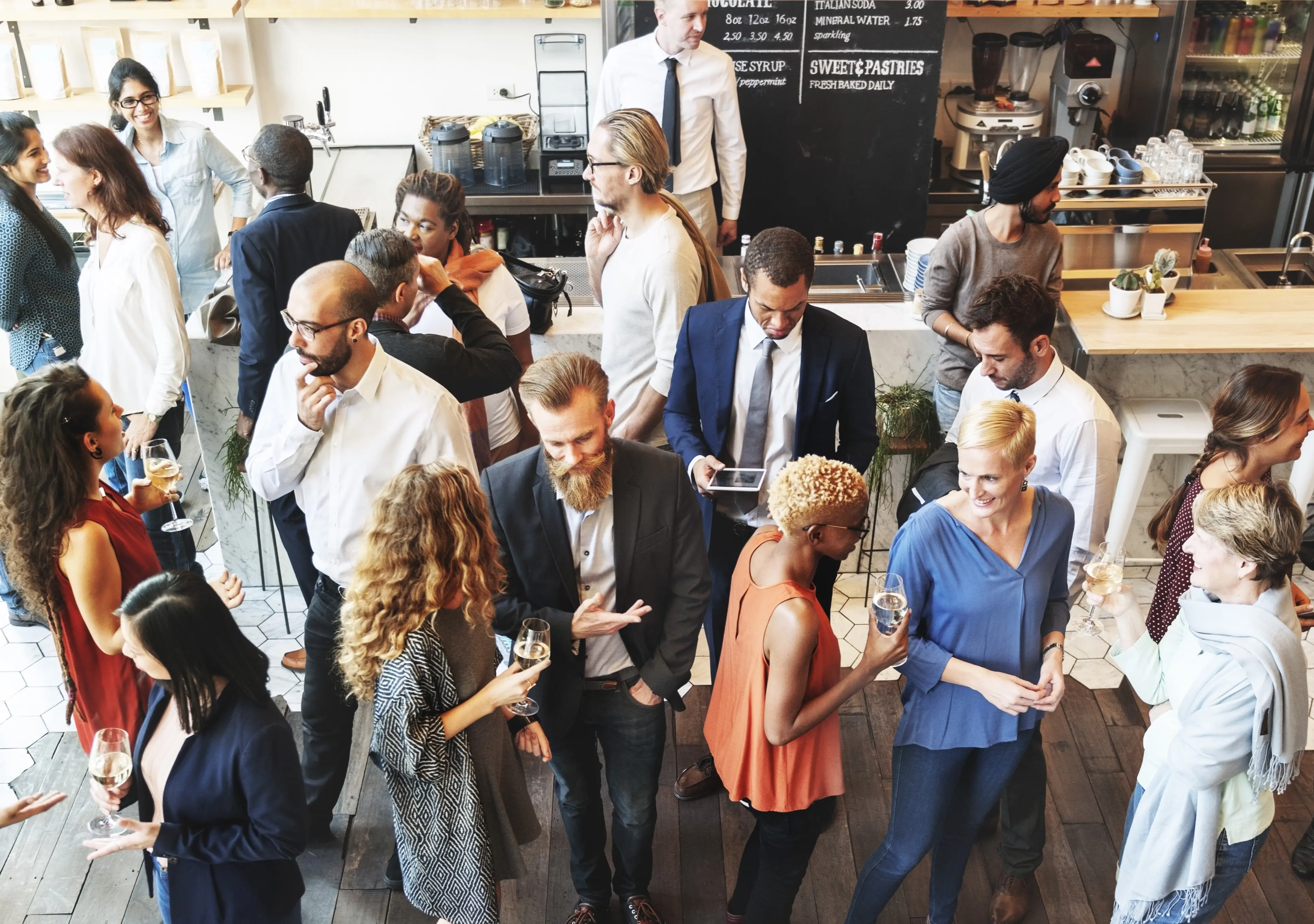 People At Event Standing And Talking