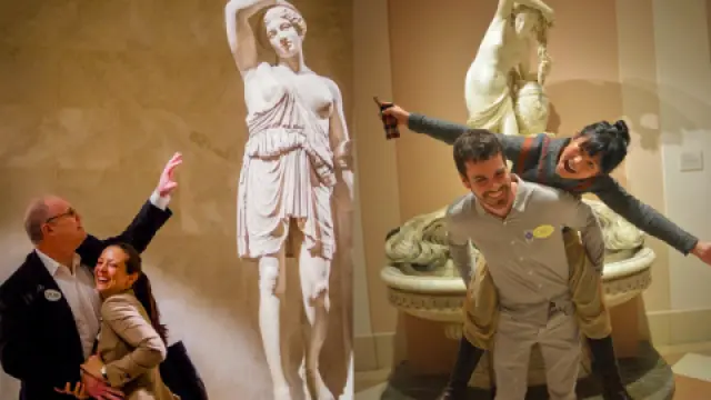 Group Of People In A Museum