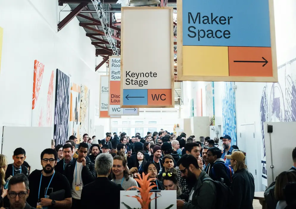 crowd in an exhibition hall