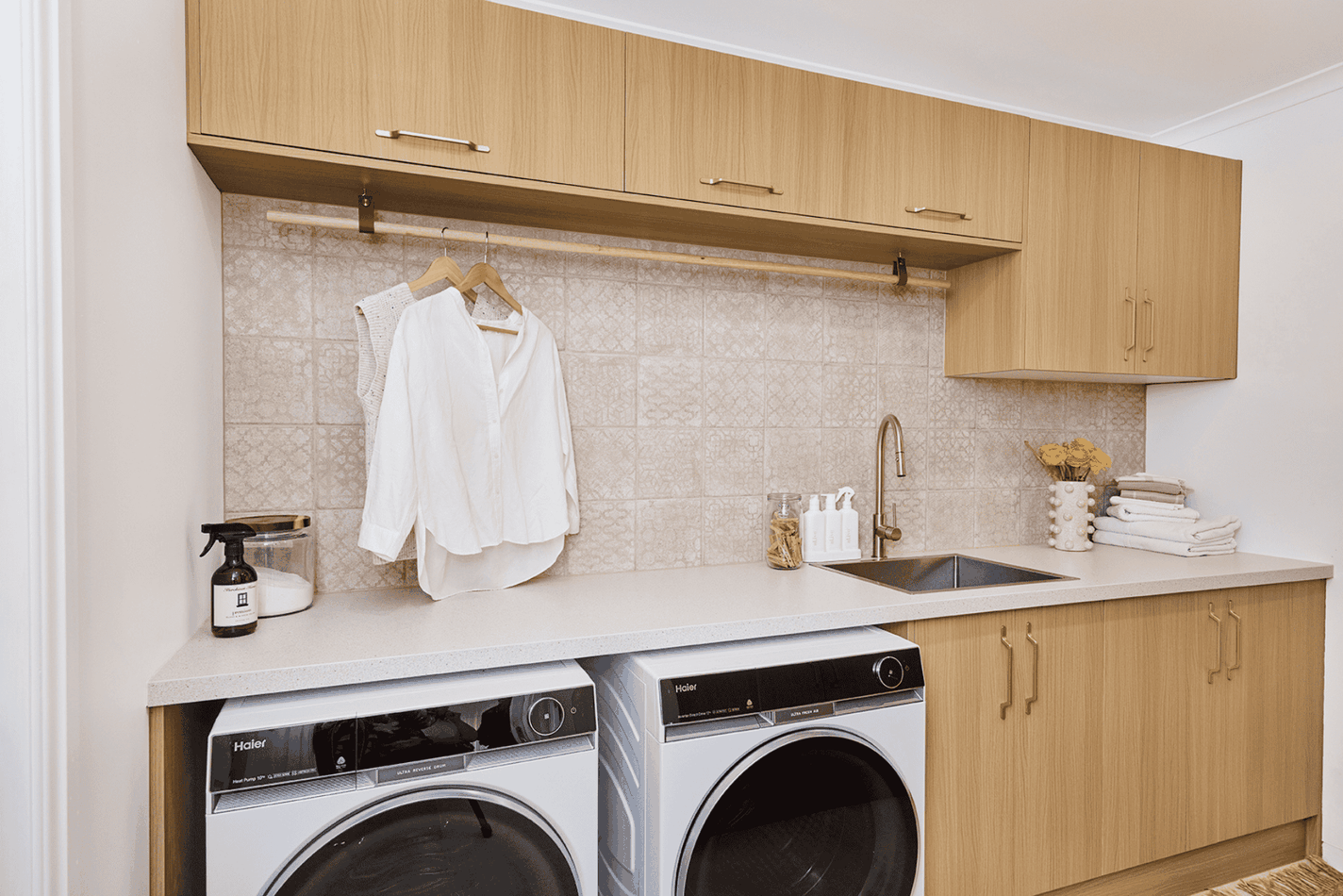 Abbey Holmes x kaboodle collaboration, light timber cabinets and stone look benchtops