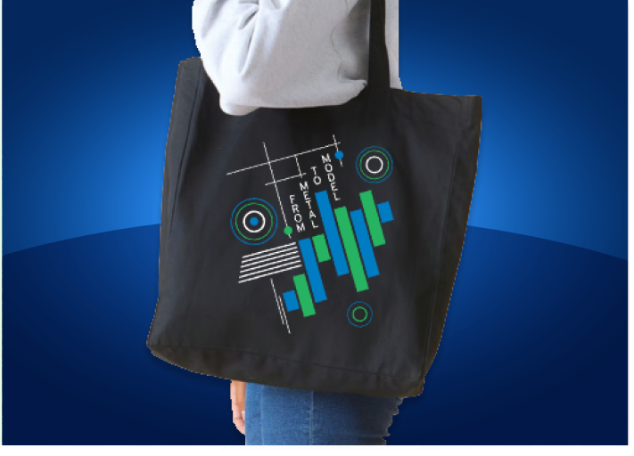 Person holding a black tote bag with a geometric design and text "From Model to Reality" in blue and green on a blue gradient background.
