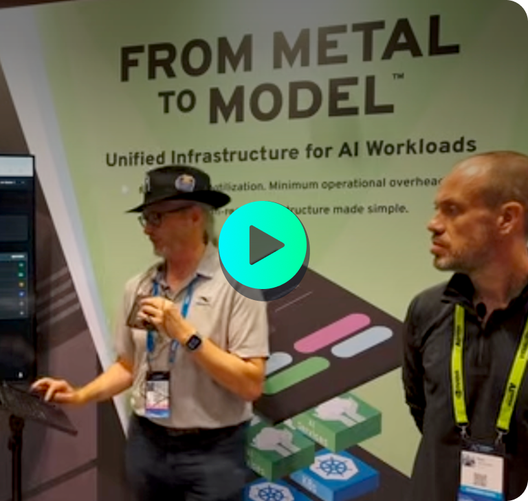 Two men stand in front of a poster titled "From Metal to Model," discussing unified infrastructure for AI workloads at a tech event.