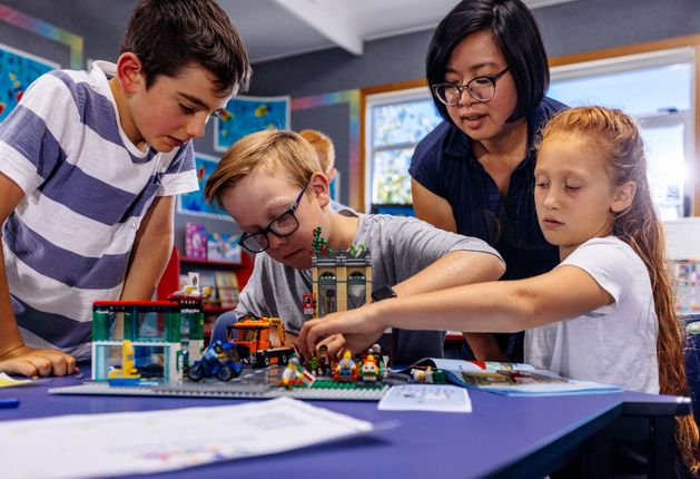 Children and a facilitator enjoying a Play Included Brick Club