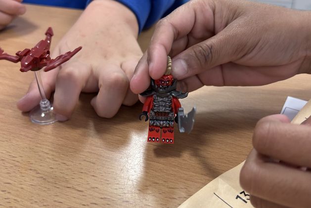 Children in Brick club building with LEGO bricks