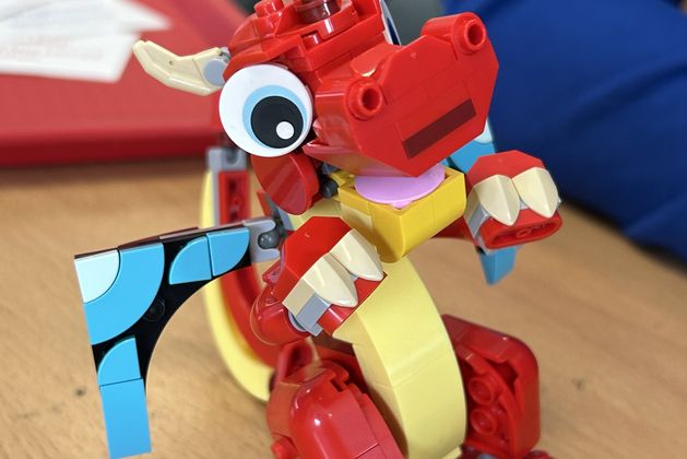 A red dragon made out of LEGO bricks made in Brick club