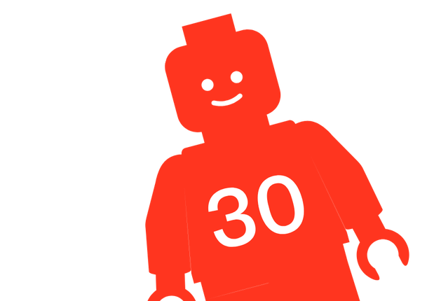 Lego Brick man in red with 30 written on his chest in white