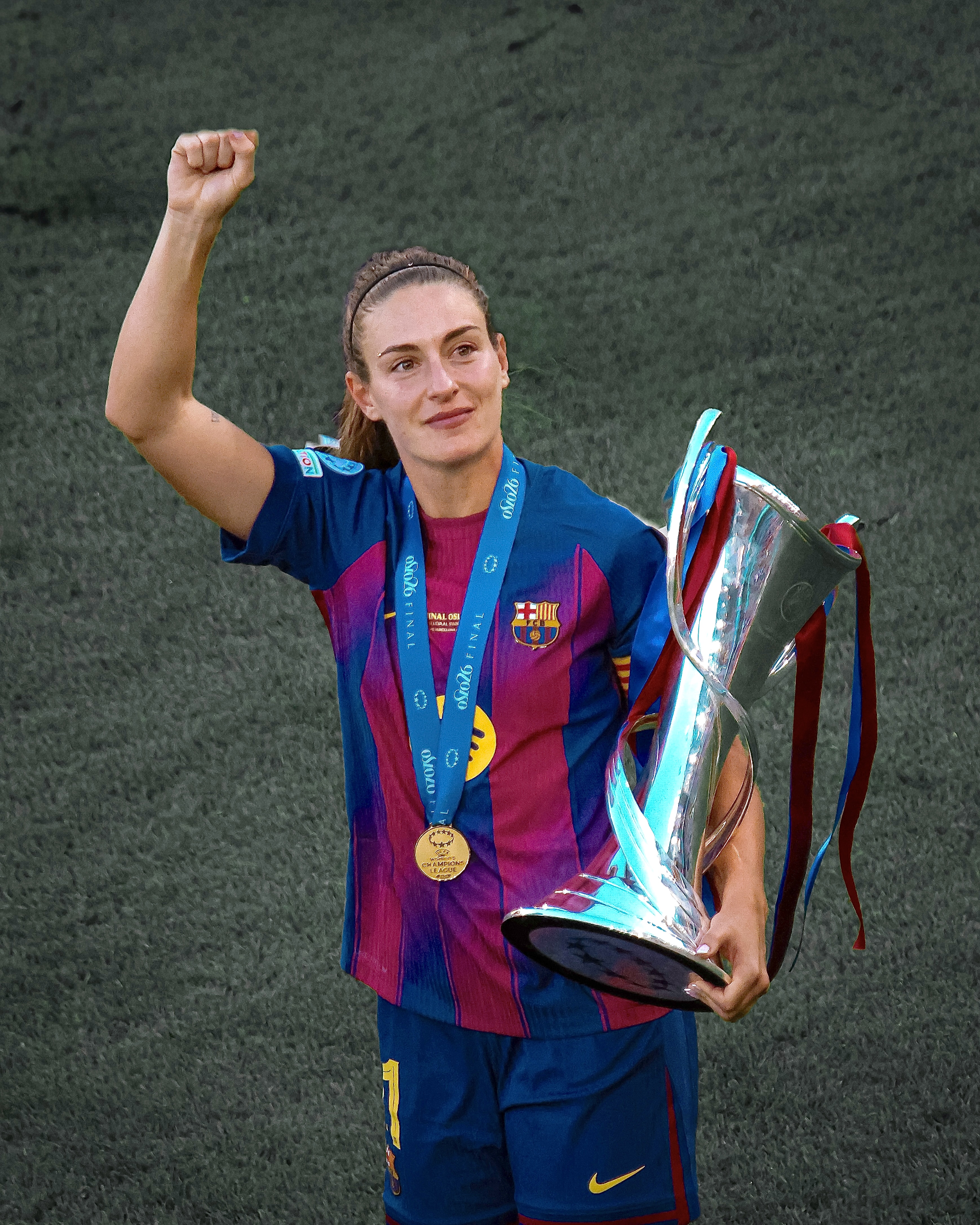 Alexia Putellas holds the UEFA Women's Champions League trophy after Barça's 4-0 win over Lyon in the 2026 final