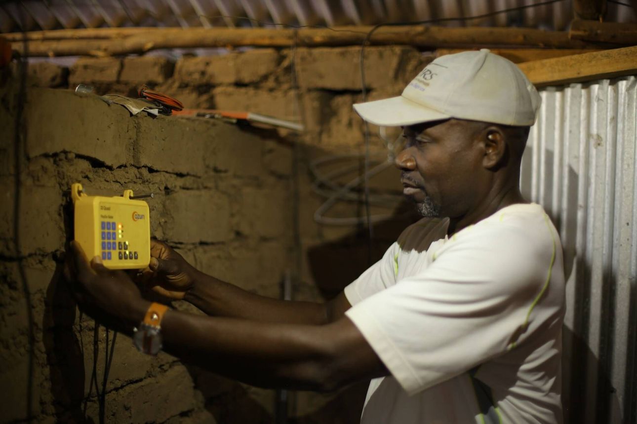 Man working on energy access