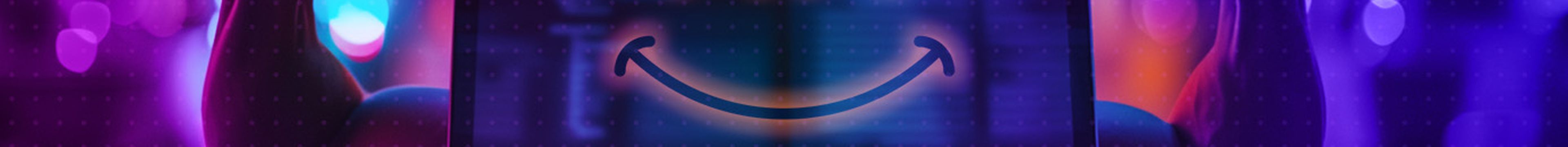 A laptop with muscular arms coming out from behind and a smiley face on the screen