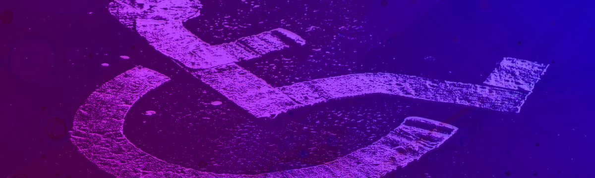 Disabled symbol on road.