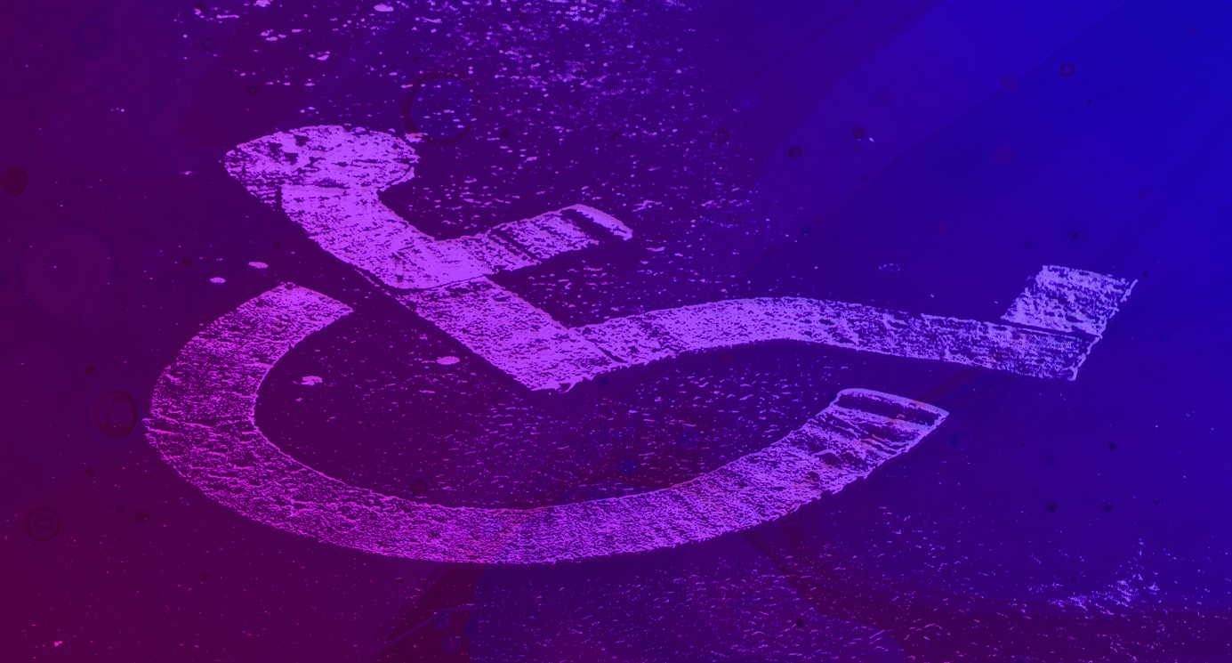 Disabled symbol on road.