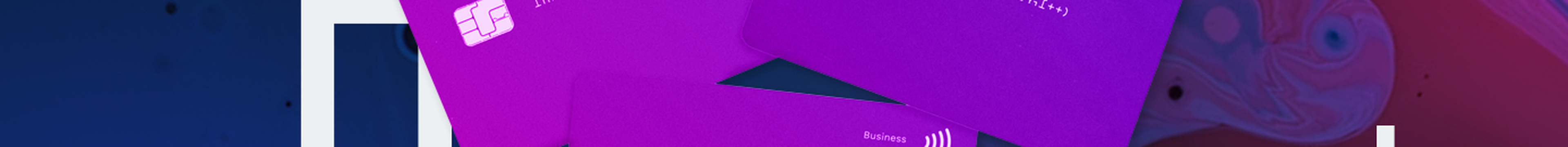 Credit cards with binary icons on neon background.