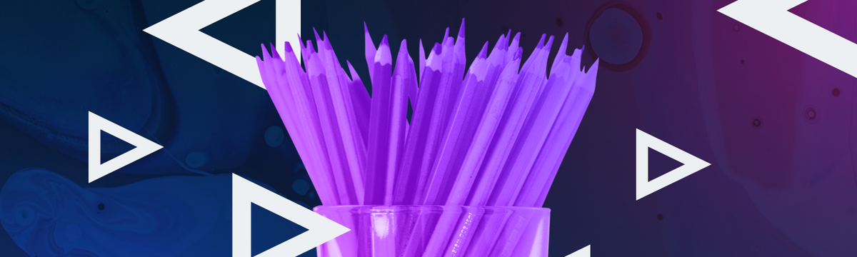 Many pencils in a clear glass jar on neon background.
