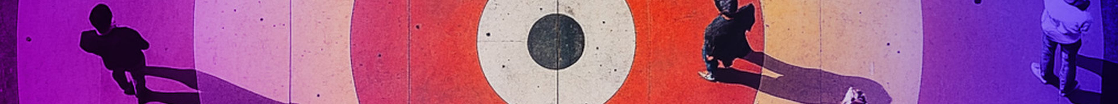 aerial view of a target with people walking across it