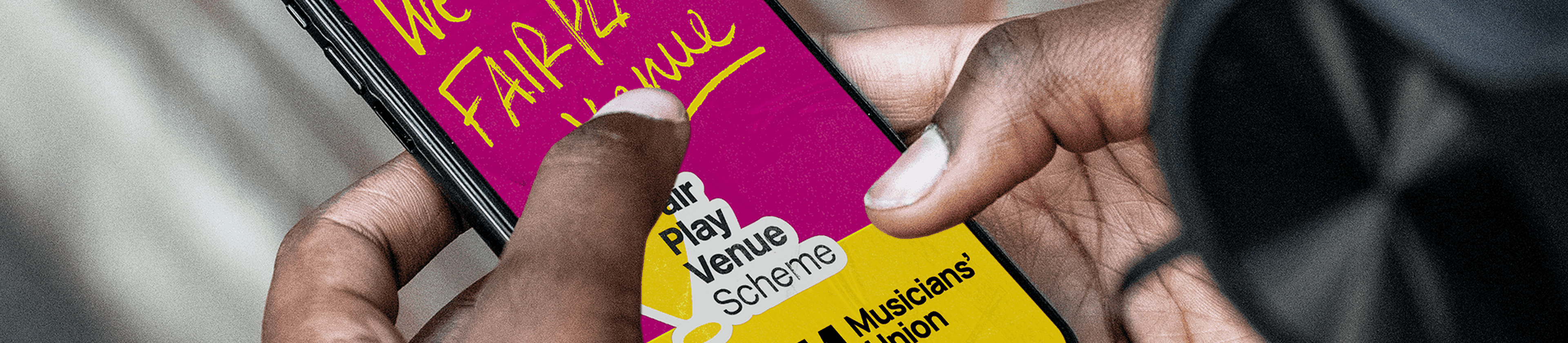 Fair play venue design assets on a mobile phone.