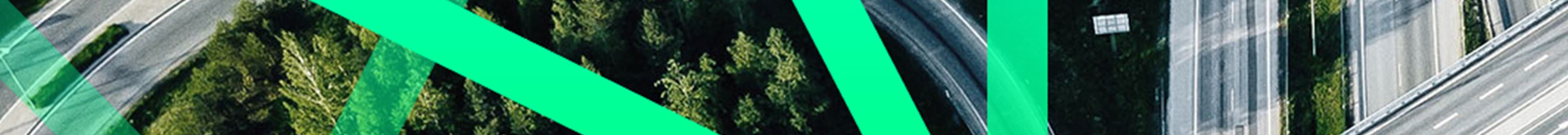Birds-eye view of motorway with a green abstract graphic overlayed.