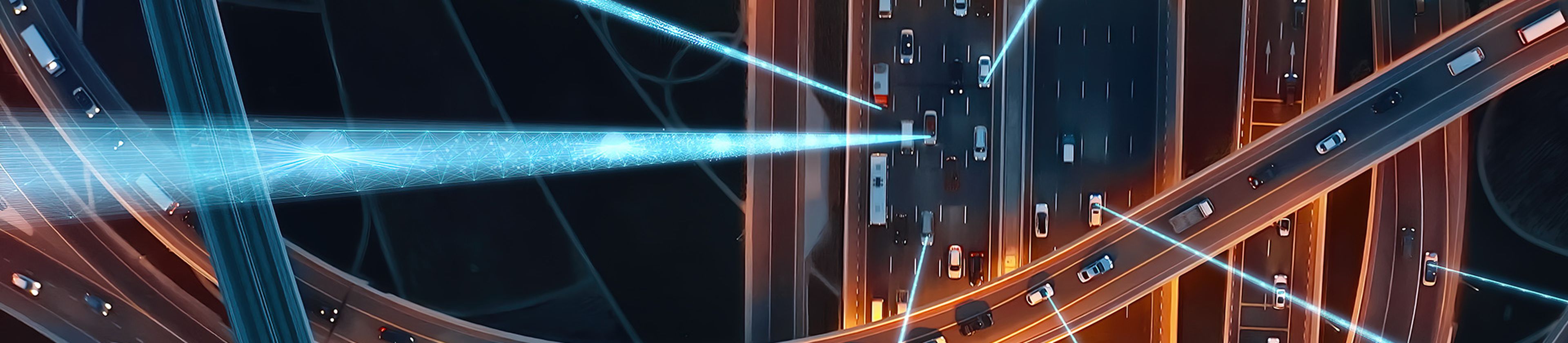 Birds-eye view of motorway at night with abstract graphic to signify connections and data.