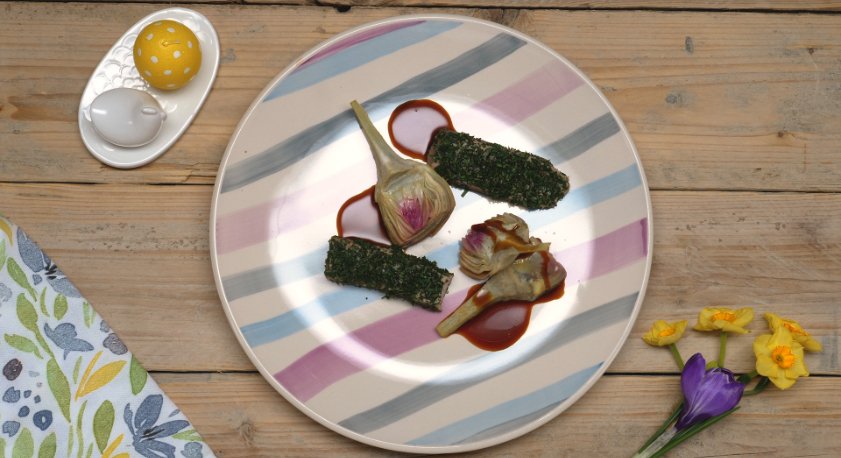 Lombata di agnello al vapore con carciofi stufati