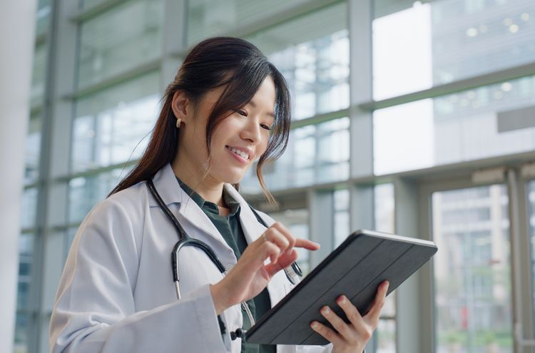 Female Doctor with tablet